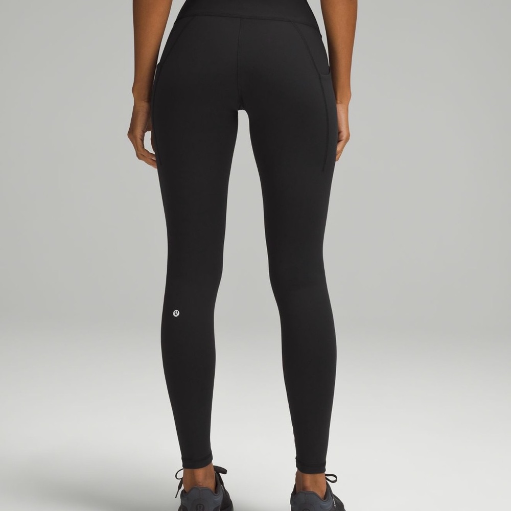 Lululemon wunder train high rise with pockets 28”